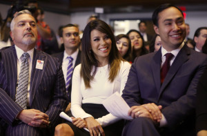 Actress Eva Longoria, center, Henry R. Munoz III, co-founder of the Latino Victory Project, left, and Rep. Joaquin Castro, D-Texas, are seated at an event launching The Latino Victory Project, a Latino political action committee, at the National Press Club in Washington, Monday, May 5, 2014. (AP Photo/Charles Dharapak) ORG XMIT: DCCD101
