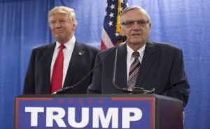 Republican presidential candidate Donald Trump, left, is joined by Maricopa County, Ariz., Sheriff Joe Arpaio during a new conference at the Roundhouse Gymnasium, Tuesday, Jan. 26, 2016, in Marshalltown, Iowa. (AP Photo/Mary Altaffer)