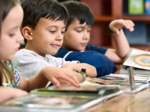 Hispanic students in library